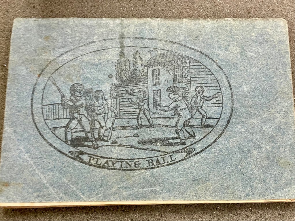 Booklet cover illustration of children playing baseball.