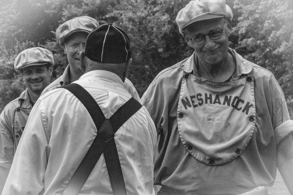 As the game ends, opponents shake hands.
